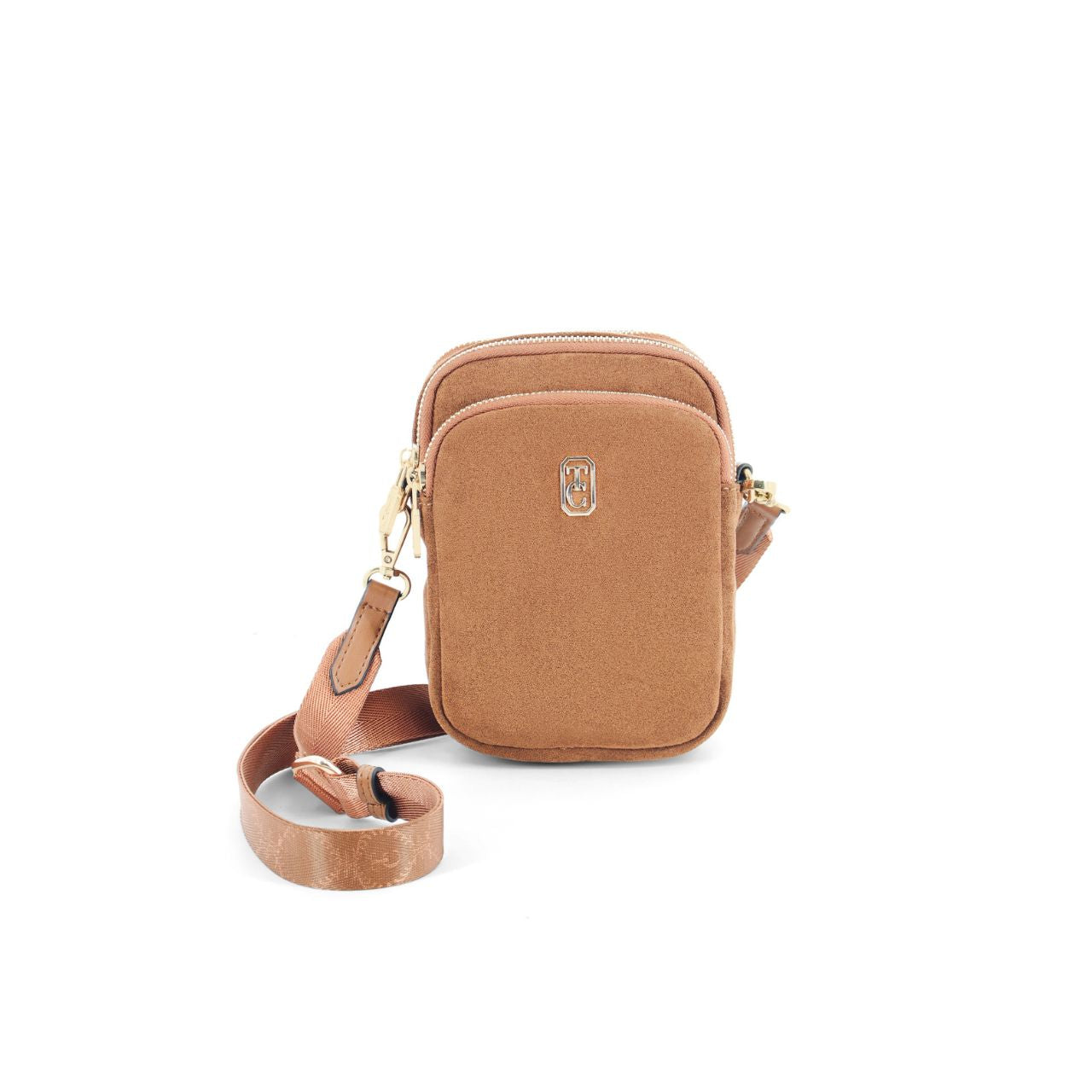 The Naples Mini Cross Body Bag from Tipperary brings effortless style to your everyday carry. Crafted from soft suede, this compact crossbody features a sleek silhouette perfect for hands-free convenience.