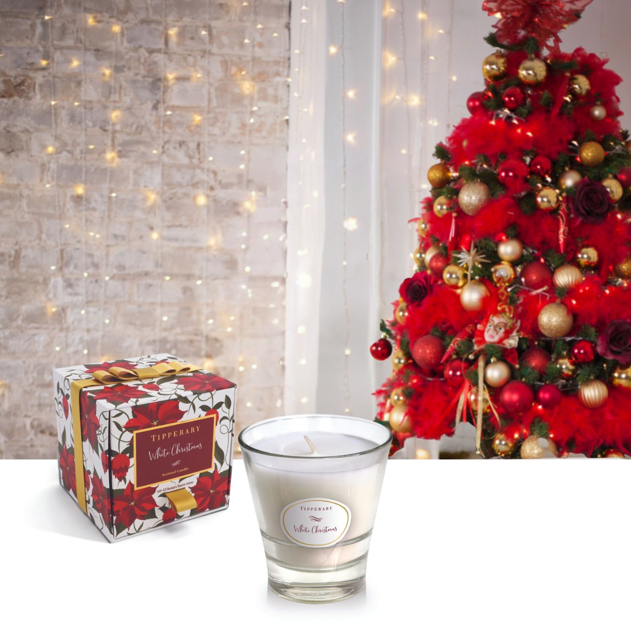 White Christmas Poinsettia Tumbler Candle by Tipperary  A classic Christmas fragrance with warm notes of orange spice amber and musk. Bringing festive cheer to your home.