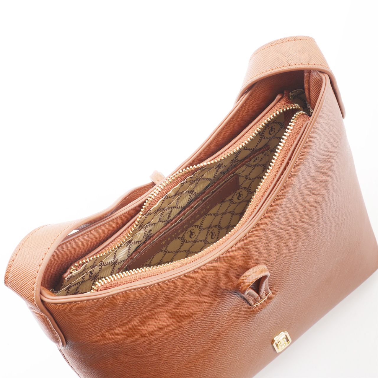 Discover the perfect combination of style and functionality with the Tipperary Soiree Handbag in Tan. Made by Tipperary, this handbag's sleek design features multiple pockets and a spacious interior, making it the ideal accessory for any occasion. Elevate your wardrobe with this must-have accessory.