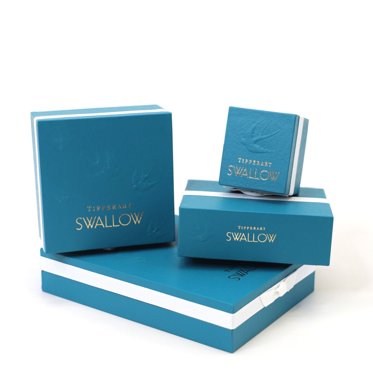 The Swallow Stud Earrings - Gold feature a delicate design of a swallow in mid-flight, symbolizing freedom and grace. These earrings add a subtle touch of elegance to any look. Their timeless design makes them perfect for both everyday wear and special occasions, offering a charming and sophisticated accent to your jewellery collection.