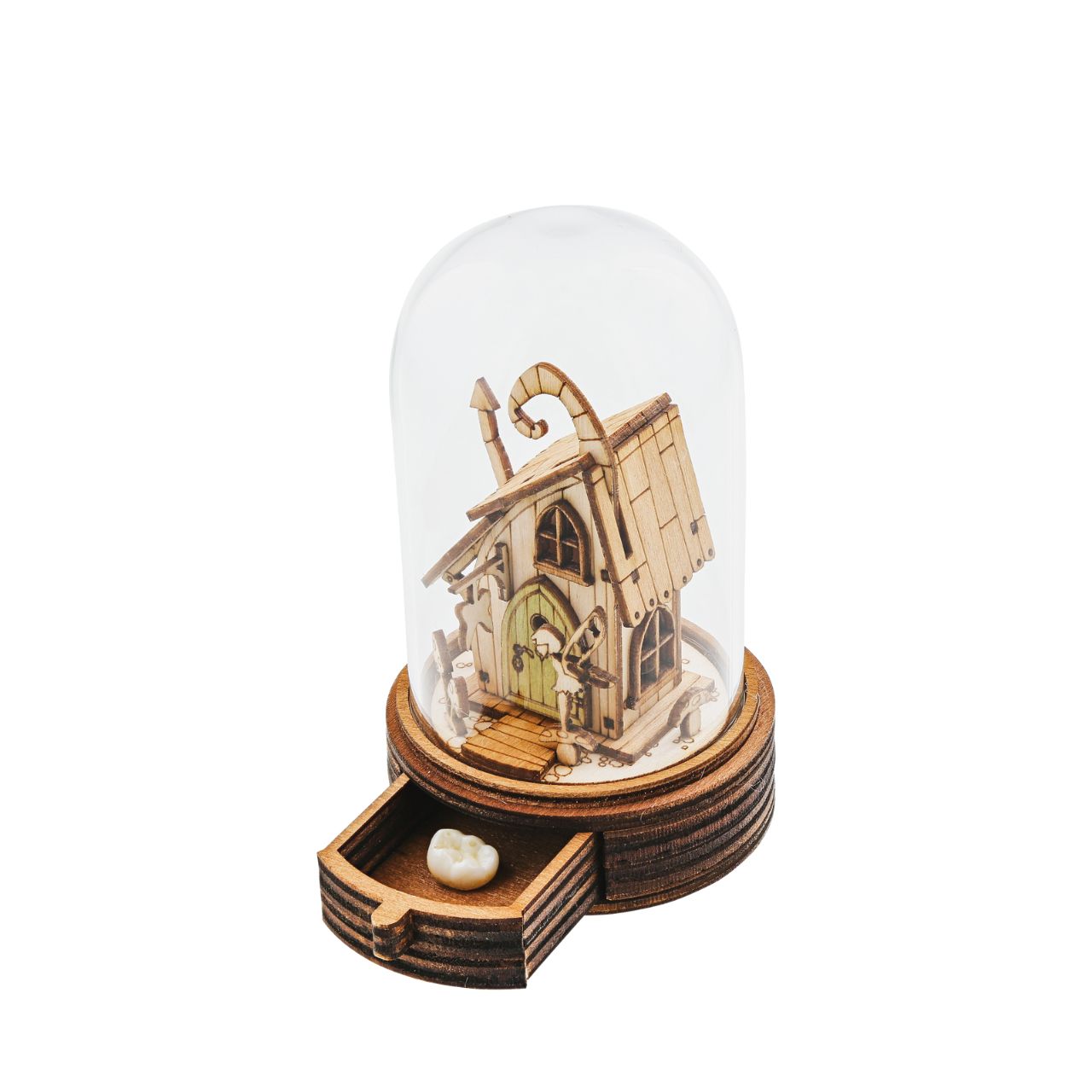 Everyone knows the story of the Tooth Fairy and now Kloche has a new way to bring that magic to your children. This glass dome decoration encases a detailed miniature of the Tooth Fairy themself in front of their Fairy home. What sets this apart from other pieces in the collection, is the little drawer built into the bottom, the perfect size for those lost teeth or a little treat from the Fairy.