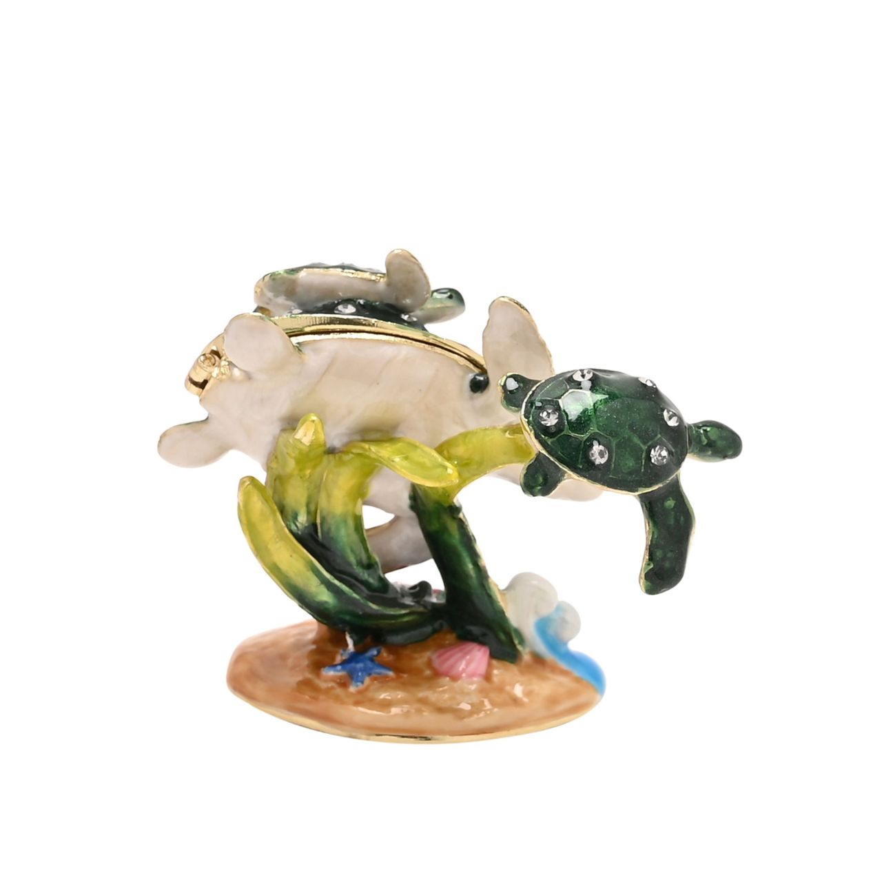 Step into the enchanting world of the Treasured Trinkets – Coral Turtle by STRATTON, a whimsical and meticulously crafted trinket box that captures the endearing charm of this sea creature.