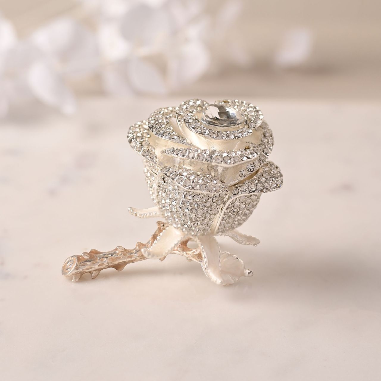 Experience the elegance of the Treasured Trinkets – crystal flower by STRATTON, a trinket box that captures the wonder of these magnificent products of nature.