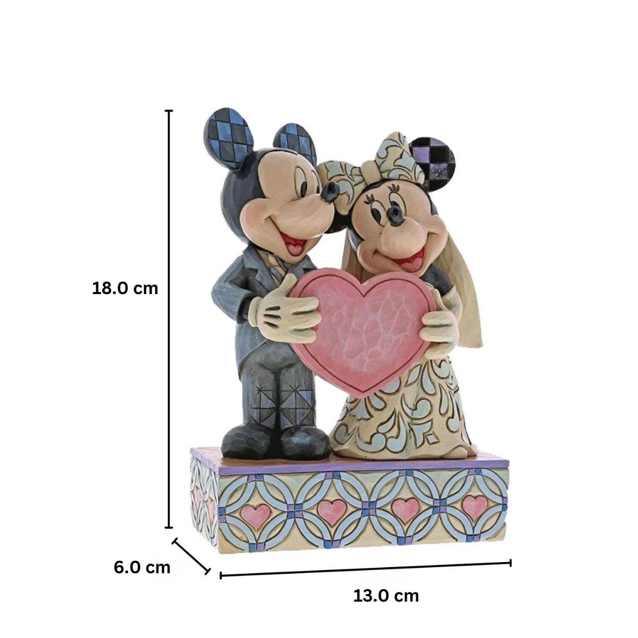 This beautifully detailed figurine is a gorgeous depiction of Mickey as a doting groom with quilted accents on his suit and Minnie as a blushing bride in a gown with rosemaling details. Unique variations should be expected as this product is hand painted. Not a toy or children's product. Intended for adults only.
