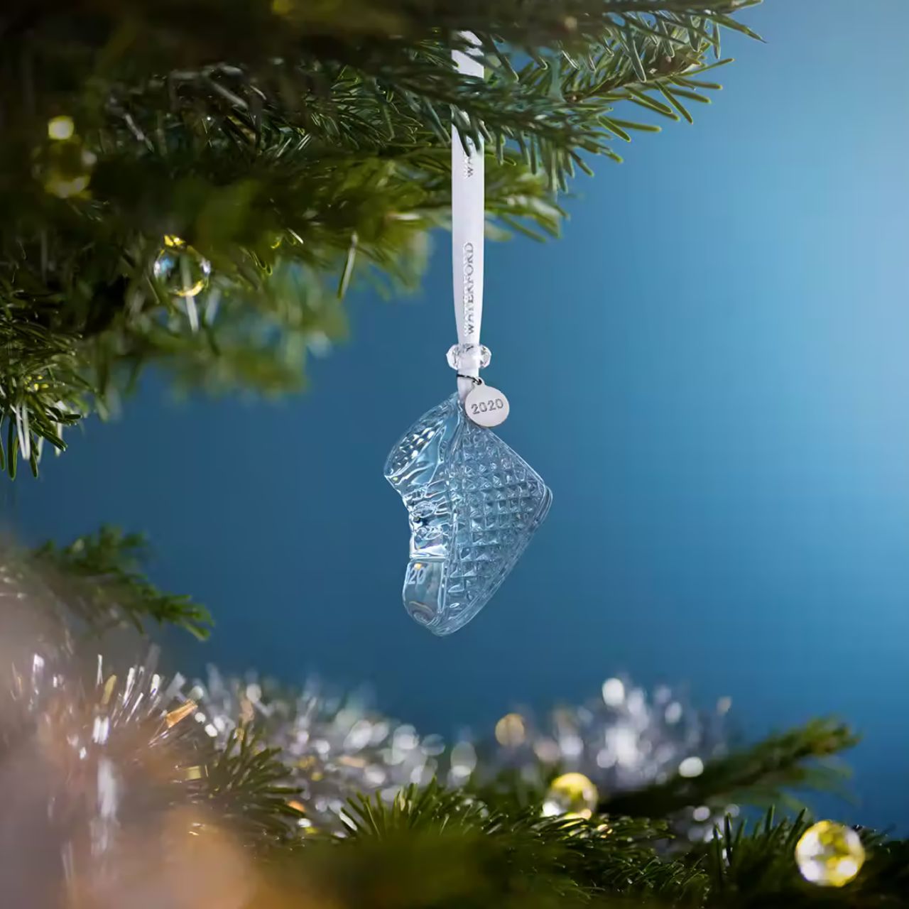 Waterford Crystal Baby's First Christmas Ornament 2020 The beautiful 2020 Baby’s First Ornament is one of Waterford’s collectable crystal ornaments. This charming baby boot features a wonderfully detailed pattern that produces unrivalled sparkle, with a round date tag to commemorate the year of Baby's First Christmas.