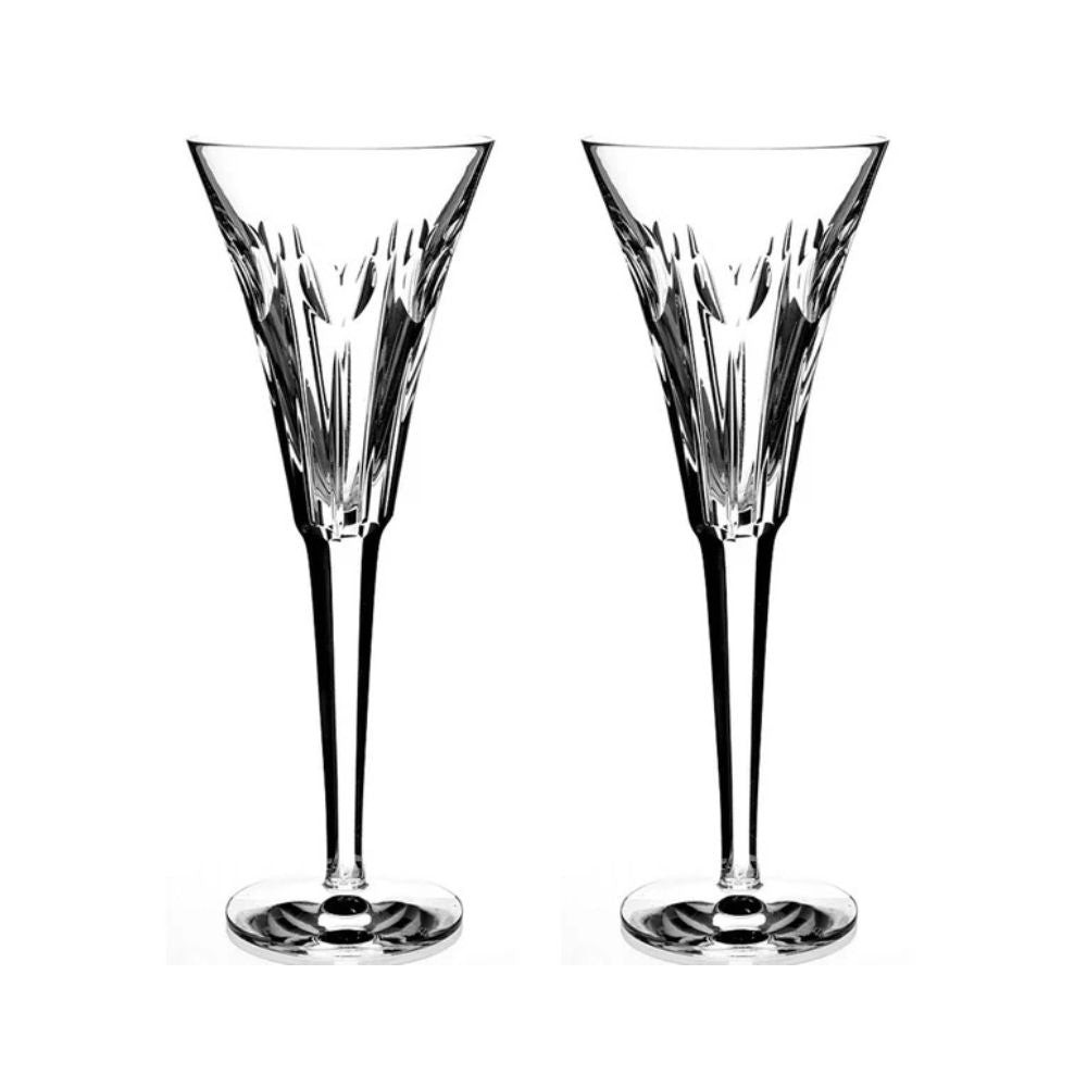 Waterford Crystal Millennium Collection Toasting Flutes - Love The collection was started in 1995. Each year a set of two flutes dedicated to one of the universal toasts was made available. The first flute was Happiness, engraved with a bow, the next Love, with a heart, then Health with a sunburst, Prosperity with a wheat sheaf and Peace with a dove.