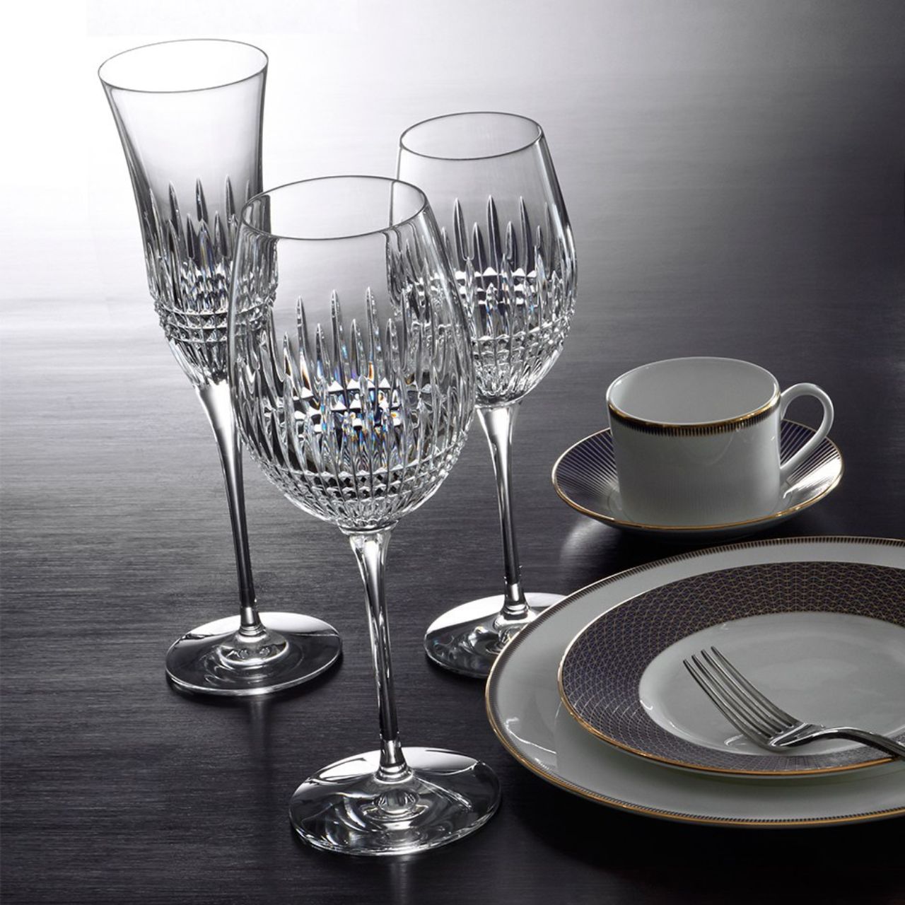 Waterford Crystal Lismore Diamond Essence Goblet Pair This classic Lismore Diamond Essence Goblet Pair from Waterford offer the perfect serve for water, juice or your favourite fruit punch, and are the ideal luxury all-purpose drinking glass for your home.