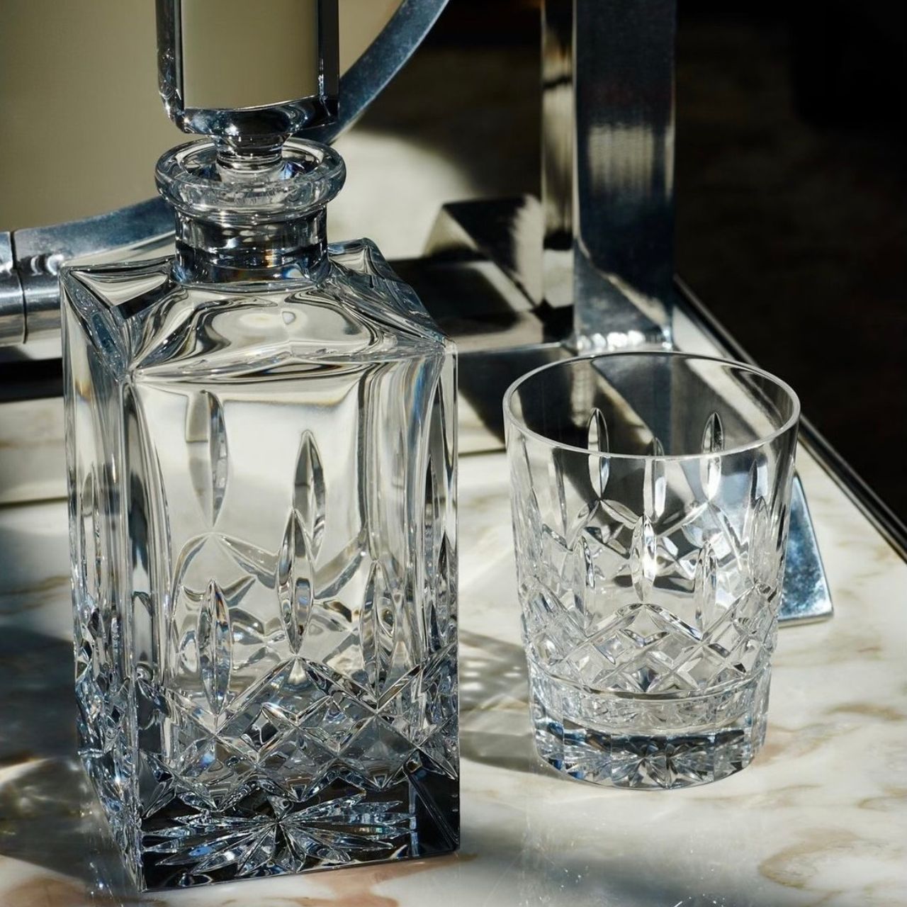 Waterford Crystal Lismore Square Decanter Proudly pour your favourite single malt from this charming Lismore 26oz Square Decanter and become a connoisseur. With its striking square profile, this traditional crystal whiskey decanter will look magnificent as it highlights the rich colour of its contents, radiating luxury and excellence as you entertain guests or savour something that is too good to share.