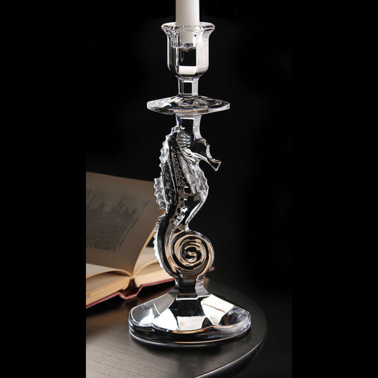 Waterford Crystal Seahorse Candlestick A dramatic statement piece, the Collection by Waterford takes inspiration from the logo of the Waterford company and the crest of the historical city of Waterford, where Ireland's premiere fine crystal is produced. This elegant candlestick combines the intricate detailing of the pattern with the comforting weight and stability of Waterford's hand-crafted, fine crystal.