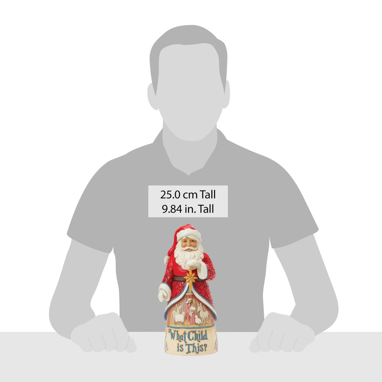 From the Santa Song Series this enchanting Jim Shore Santa beams as he holds the Christmas star, his intricate cloak parting to reveal a serene manger scene of Mary and Jesus with animals. Scripted "What Child is This,