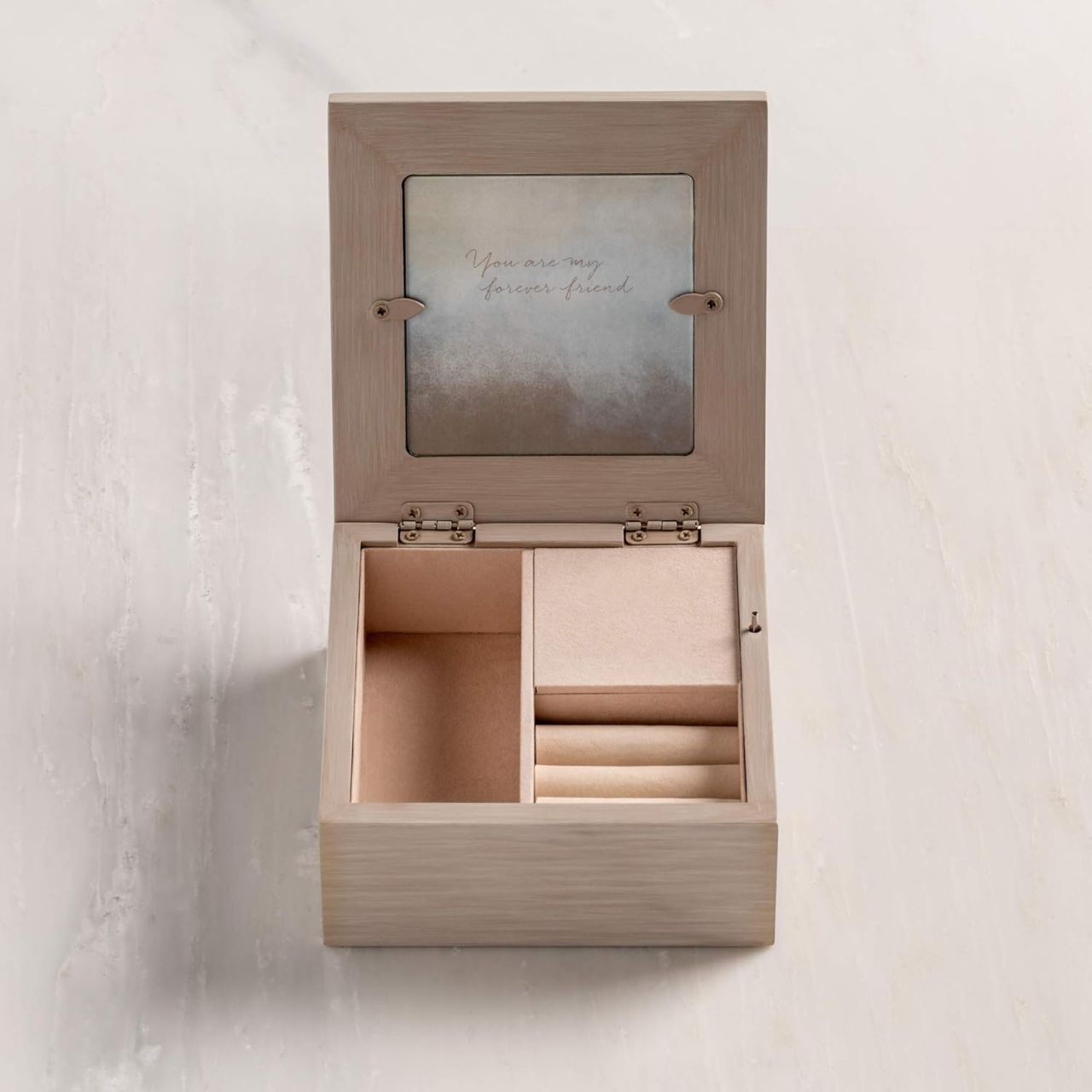 Keepsake boxes are small, sweet places to keep treasures. Give this to a friend to show your everlasting friendship with the magical touch of this also being a music box. With three different compartments this is a great gift to keep their special jewels safe.