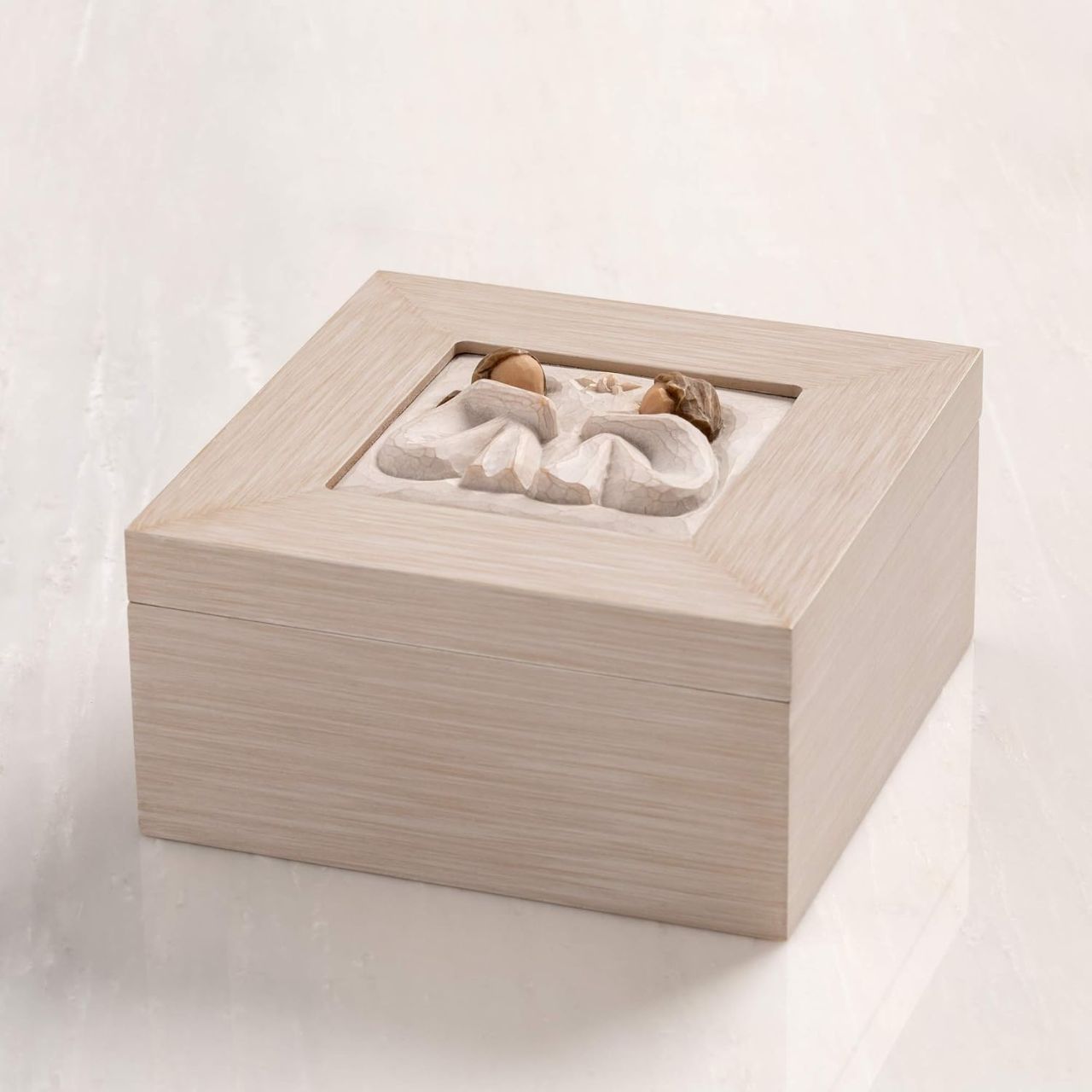 Keepsake boxes are small, sweet places to keep treasures. Give this to a friend to show your everlasting friendship with the magical touch of this also being a music box. With three different compartments this is a great gift to keep their special jewels safe.