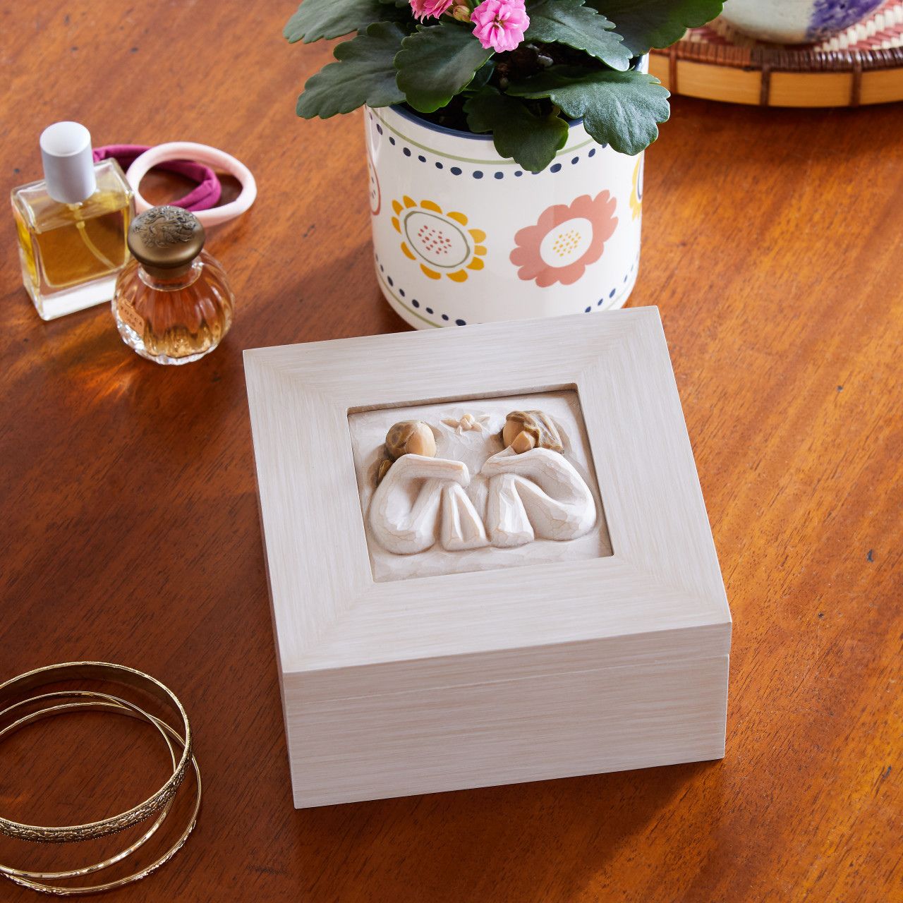 Keepsake boxes are small, sweet places to keep treasures. Give this to a friend to show your everlasting friendship with the magical touch of this also being a music box. With three different compartments this is a great gift to keep their special jewels safe.