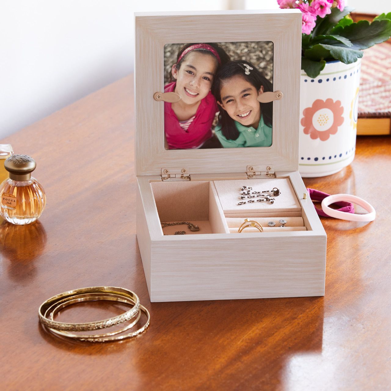 Keepsake boxes are small, sweet places to keep treasures. Give this to a friend to show your everlasting friendship with the magical touch of this also being a music box. With three different compartments this is a great gift to keep their special jewels safe.