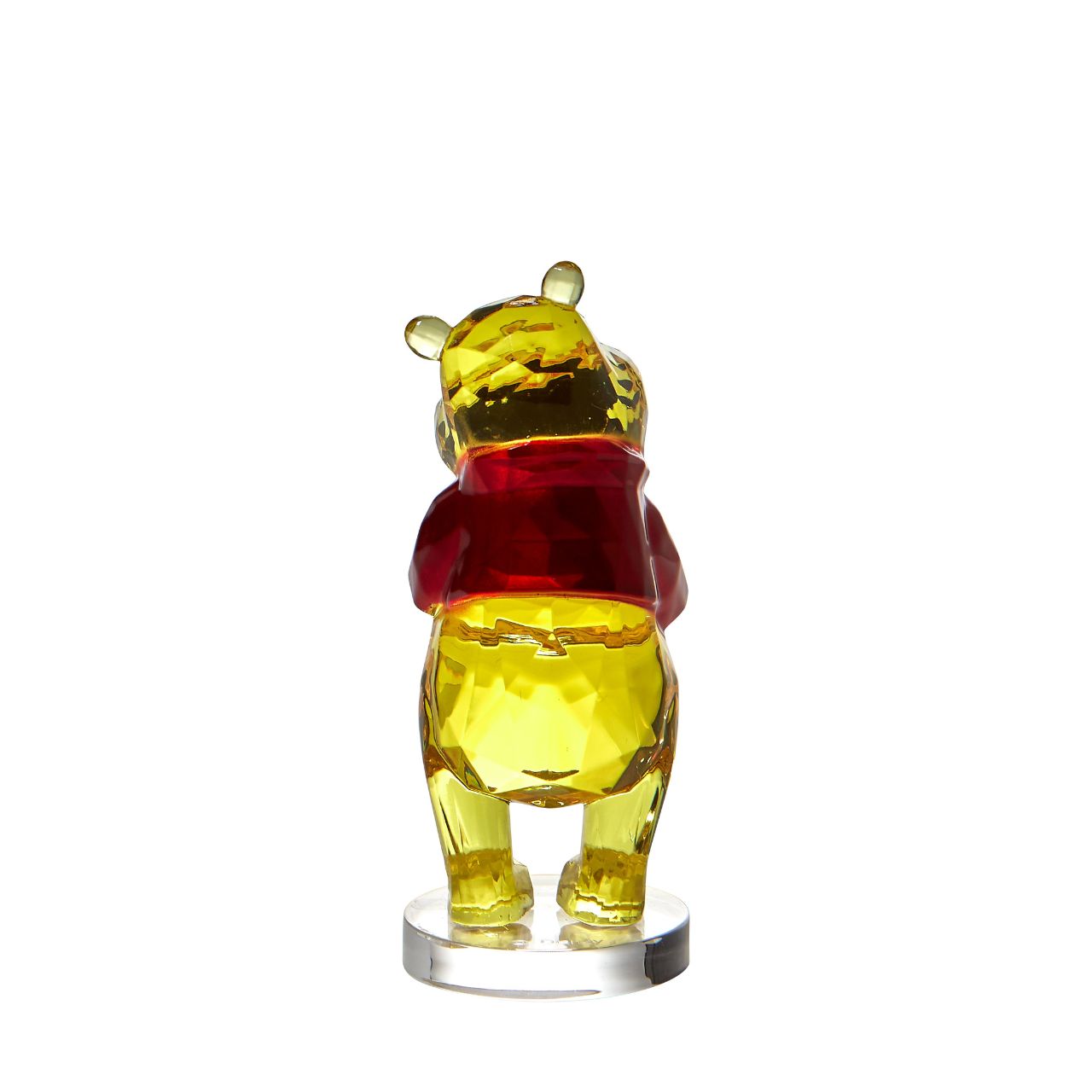 Disney Winnie The Pooh Facets Figurine This "gem cut" acrylic sculpture reflects Winnie the Pooh's honey-sweet charm and whimsical personality. Presented in a branded window gift box. Not a toy or childrens product. Intended for adults only.