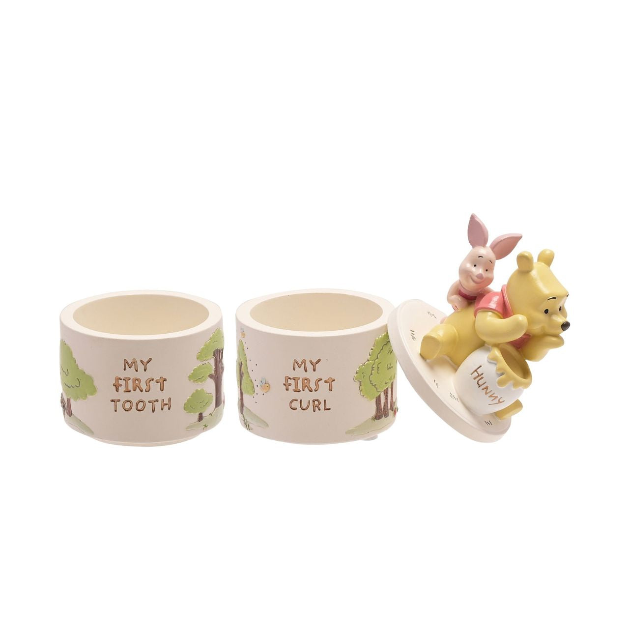 Winnie The Pooh Resin Tooth And Curl Trinket Box Set A Winnie the Pooh tooth and curl trinket box set from DISNEY. This loveable set from Magical Beginnings creates a beloved keepsake with an extra sprinkling of timeless Disney magic.