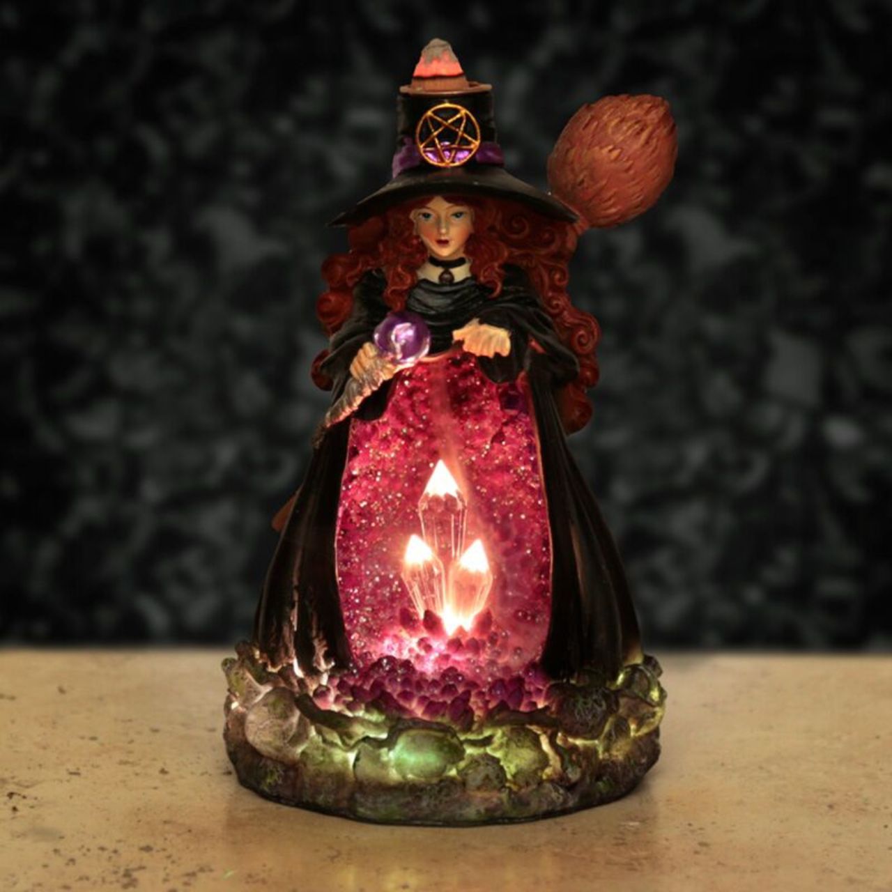 Elevate your incense experience with the Witches Crystal Cave LED Backflow Incense Burner. Designed for expert use, this burner features a unique backflow mechanism that creates mesmerizing smoke cascades resembling a mystical cave.