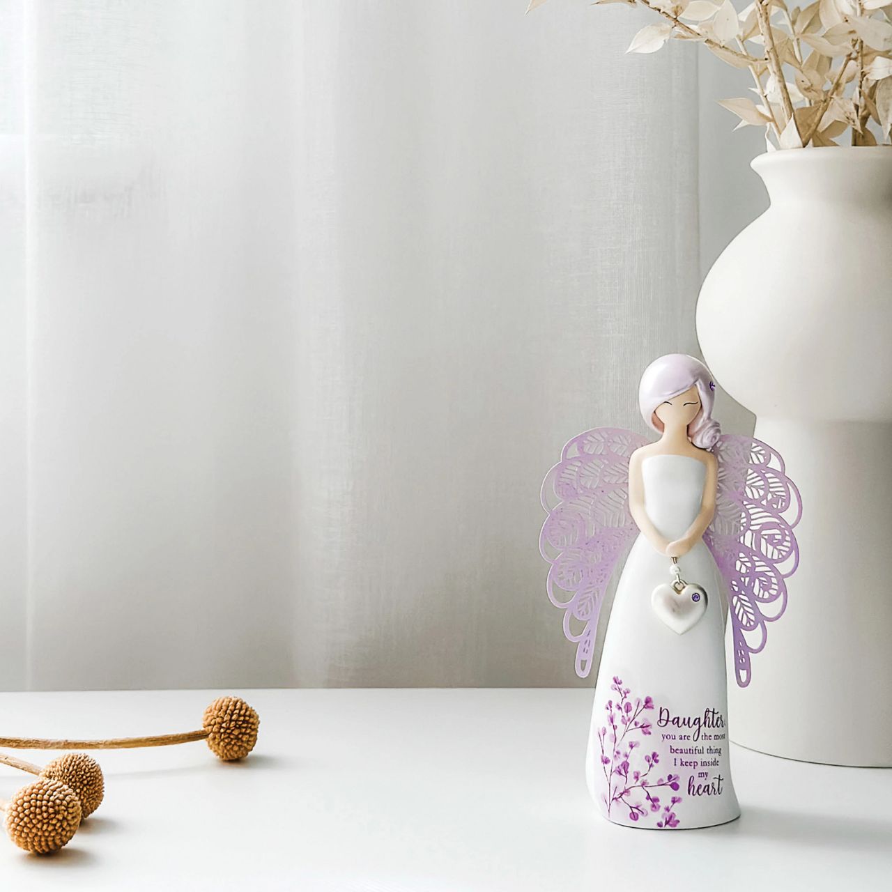 Thank You Angel Figurine - Daughter "Daughter you are the most beautiful thing I keep inside my heart" Looking for a thoughtful gift that's both beautiful and meaningful? These stunning angels are the perfect way to show someone special just how much they mean to you.