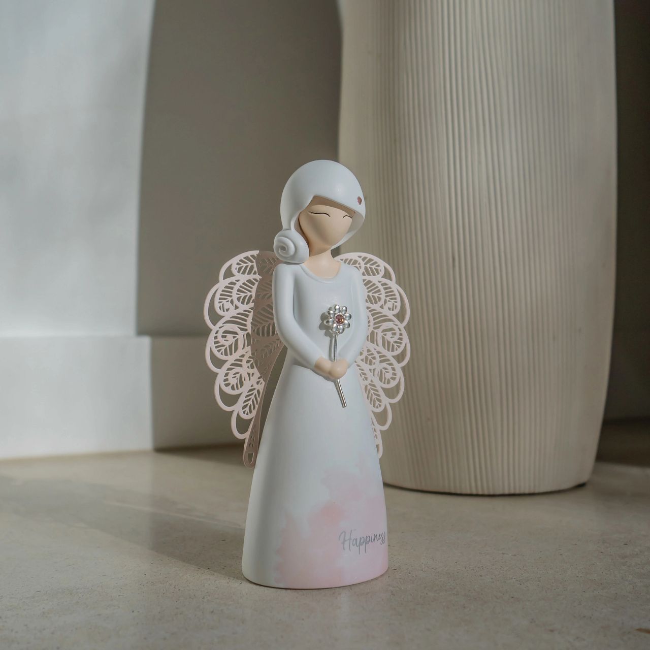 Thank You Angel Figurine - Happiness Looking for a thoughtful gift that's both beautiful and meaningful? These stunning angels are the perfect way to show someone special just how much they mean to you. Standing 12.5cm tall, they are perfect as a gift and home decoration.