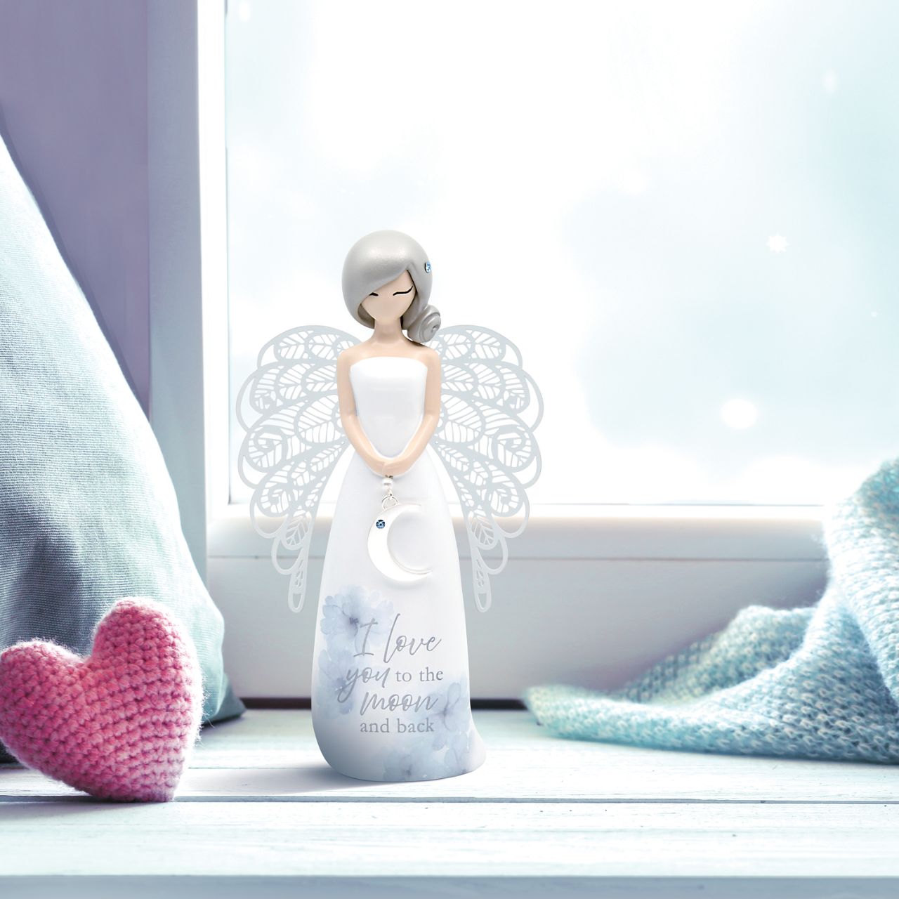 Thank You Angel Figurine - Moon & Back "I love you to the moon and back" Looking for a thoughtful gift that's both beautiful and meaningful? These stunning angels are the perfect way to show someone special just how much they mean to you.