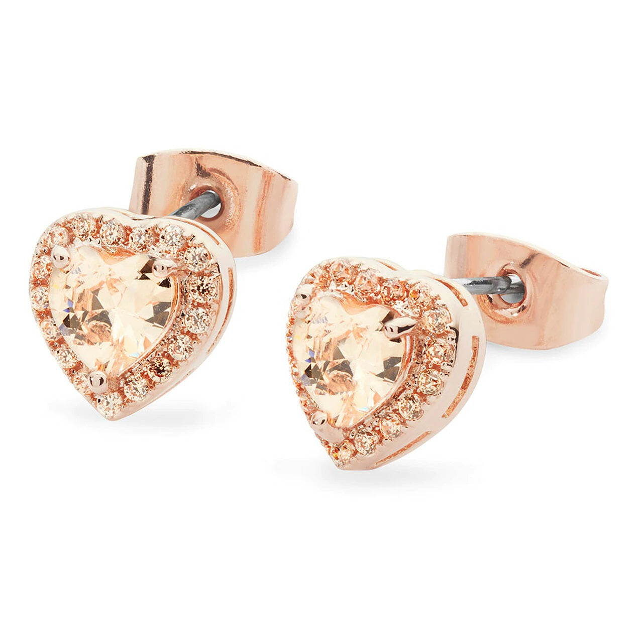 Crafted in rose gold, each eye-catching stud earring features an enchanting heart-shaped champagne crystal center stone framed with a border of shimmering crystal accents. Buffed to a bright lustre, these earrings secure comfortably with push backs.