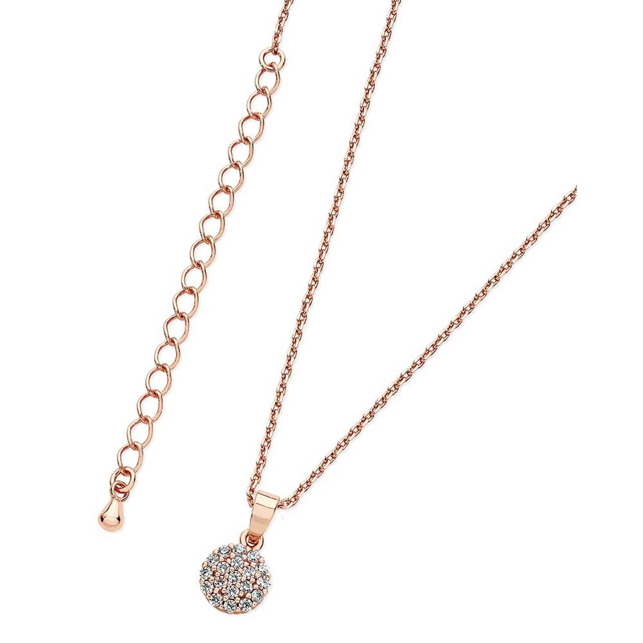 Dainty and dazzling, this crystal drop pendant focuses on the sparkle. Crafted in warm rose gold, this petite round disc of shimmering clear crystal stones shimmer under a graceful bale.