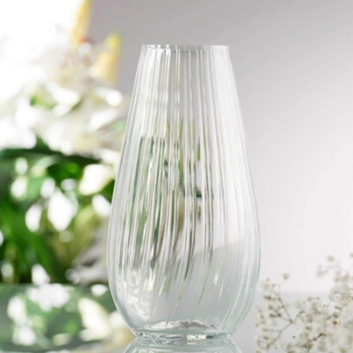 Galway Crystal Erne 9.5" Vase A pattern taking inspiration from the River of the same name. Rising in County Cavan and rippling throughout Fermanagh then turning west into Donegal Bay.