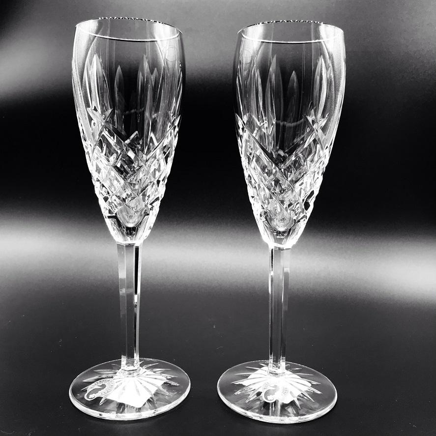 Waterford Crystal Araglin Flute Champagne Pair The Araglin Collection by Waterford is characterized by diamond and vertical wedge cuts and an elegant tulip design, creating stunning crystal and stemware with a truly unsurpassed shine and brilliance.