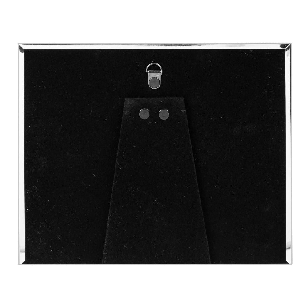 Bambino Silver Plated Photo Frame - 6" x 4" Grandchild A beautiful silver plated 6" x 4" (15x10cm) 'Grandchild' photo frame from BAMBINO BY JULIANA®. The frame features a crisp white mount, mirror 'Grandchild' title on the glass and crystal embellishments. Complete with luxury black velveteen standing strut.