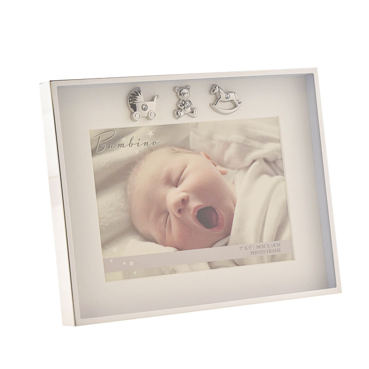 Bambino Thin Silver Plated Photo Frame 7" x 5" A gorgeous 7" x 5" silver plated photo frame from BAMBINO BY JULIANA®. The box frame is embellished with crystal finished teddy bear, pram and rocking horse icons and features a crisp white mount and standing strut.
