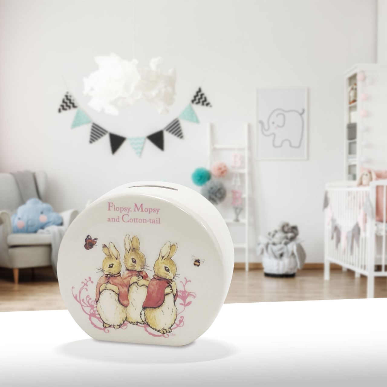 Beatrix Potter Flopsy, Mopsy & Cotton-tail Money Bank The artwork for each product is taken from the original illustrations from the Beatrix Potter stories. Material; Ceramic. Presented in a branded gift box. Not a toy or children's product. Intended for adults only.