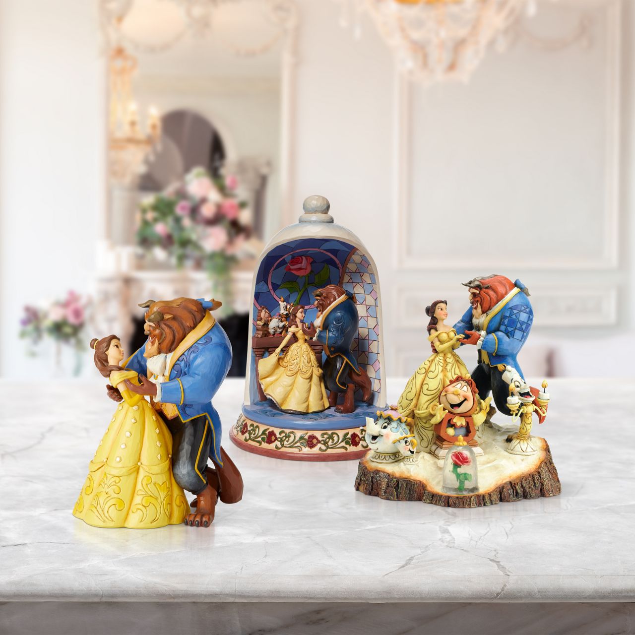 Jim Shore Disney Tale as Old as Time Carved by Heart Beauty and Beast Figurine Jim Shore continues his Carved by Heart series paying homage to Beauty and the Beast. All 6 of the beloved characters are represented in this log hewn sculpture. Designed by award-winning artist and sculptor, Jim Shore for the Disney Tradition brand.