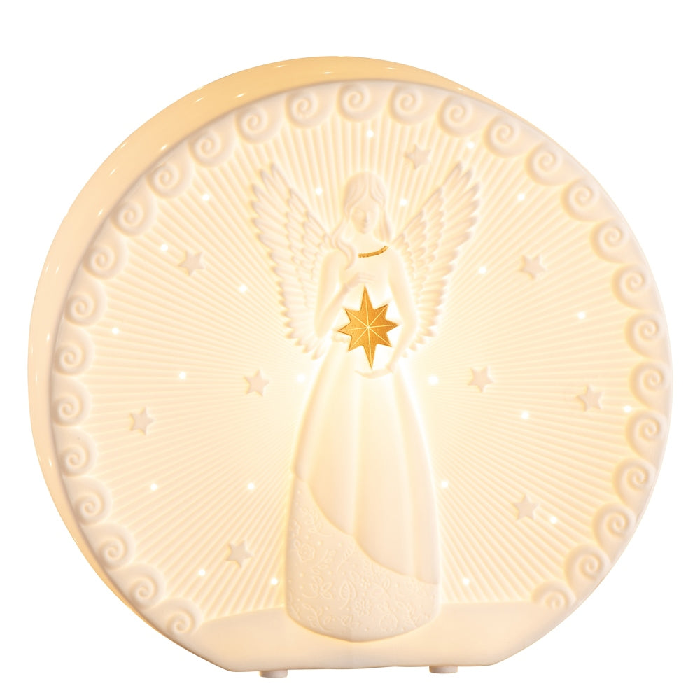 Angel Luminaire by Belleek Living Featuring an exquisitely modelled angel and stars with gold accents, this luminaire is timeless and elegant. Belleek Living Luminaire lamps emit a soft warm glow highlighting the delicate surface decoration and piercing, creating beautiful mood lighting for your home.