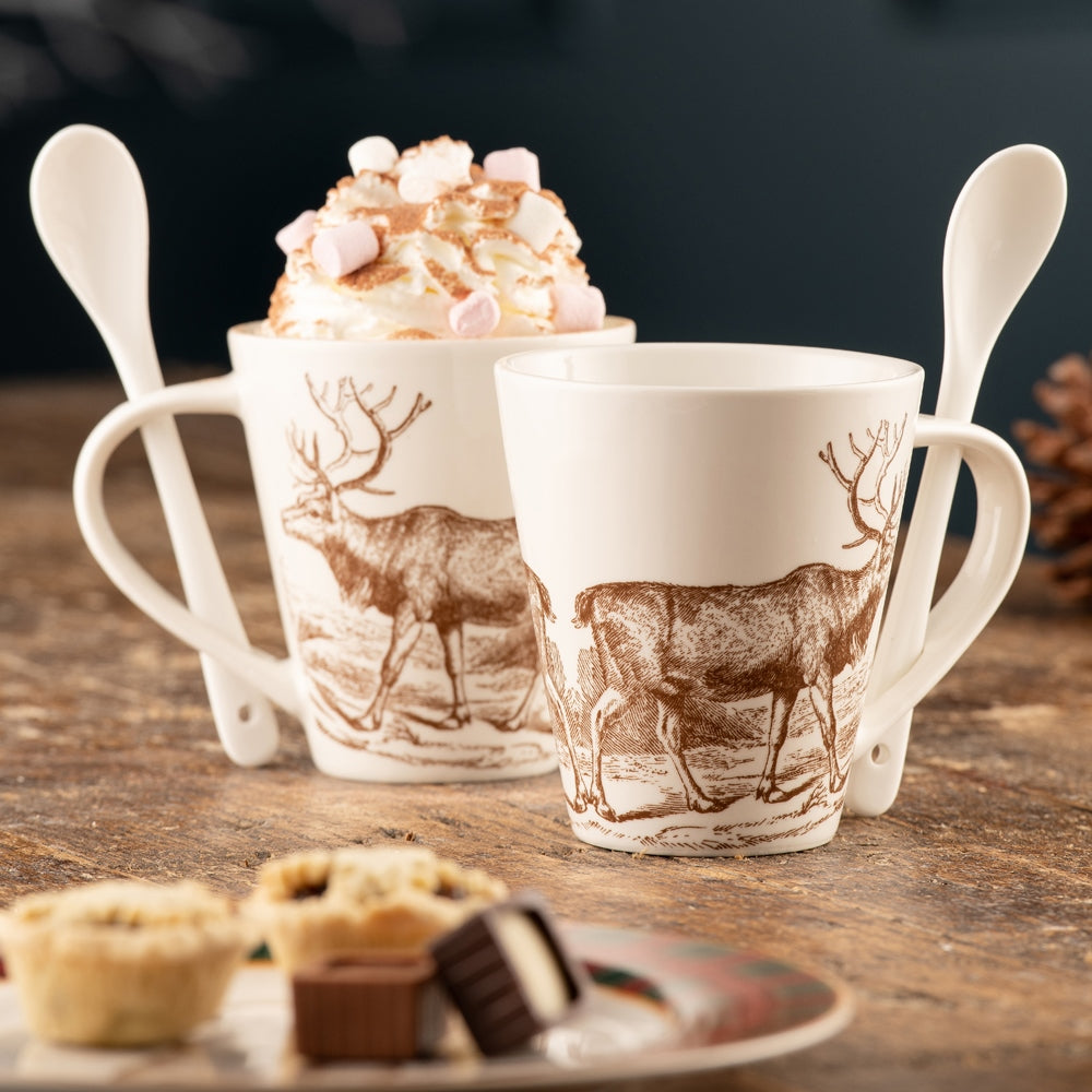 Christmas Hot Chocolate Set Reindeer Mugs & Spoons Set of 2 Share a hot chocolate with a loved one this Christmas, this set of two mugs are designed with an accompanying fine china spoons which slot into the handles for an added presentation.