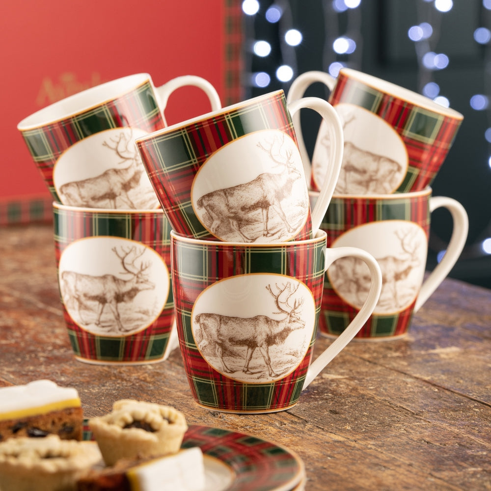 Christmas Tartan Reindeer Set of 6 Mugs Stunning green and red tartans bring to mind traditional Christmas memories and nostalgia. Festive tartan combined with charming illustrations of a friendly Christmas reindeer make for a cosy holiday tableware perfect for entertaining over the festive season.