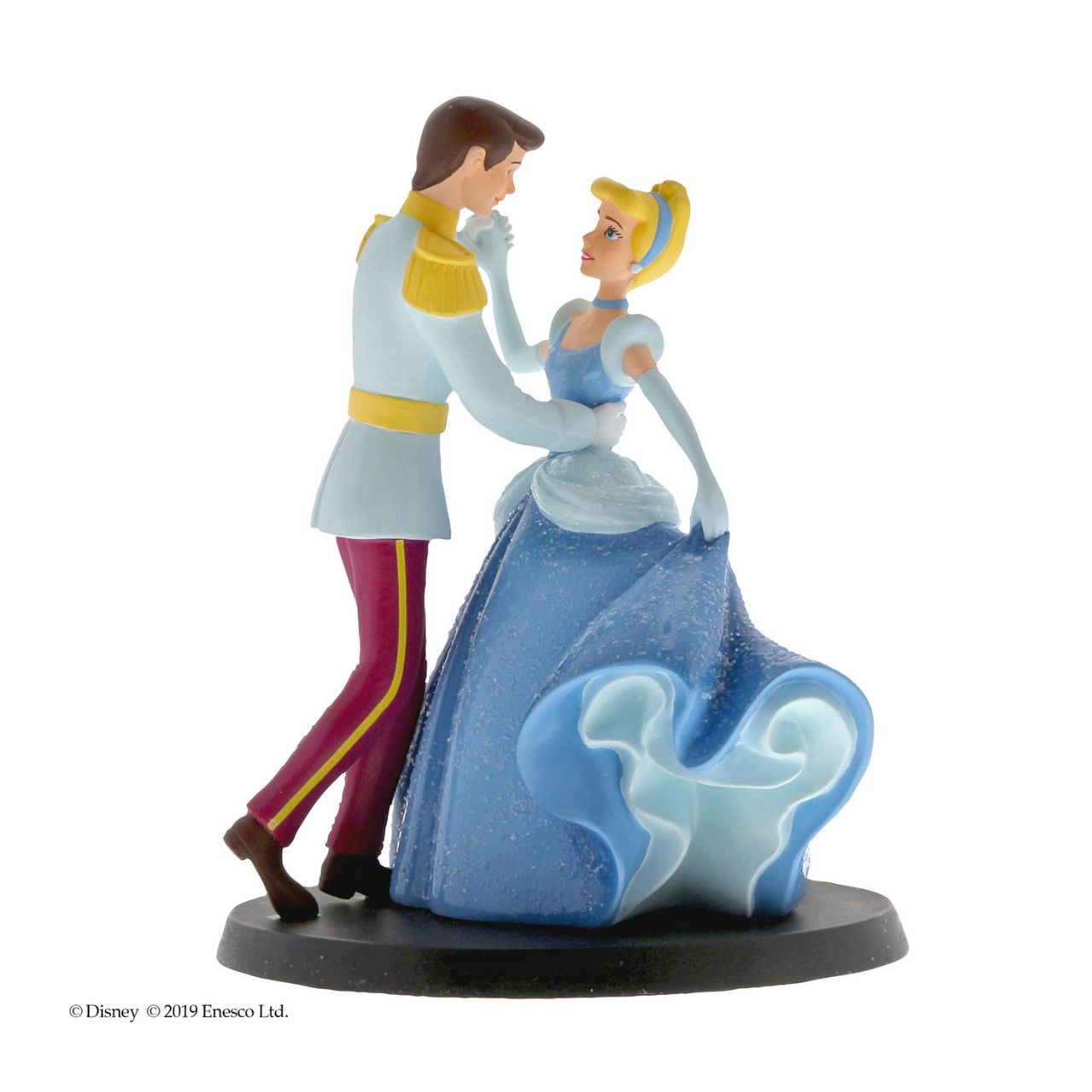 Disney Cinderella Wedding Cake Topper Place this enchanted Cinderella and Prince Charming figurine on top of your wedding cake using the plastic dish provided for a perfect representation of your happy ever after. The figurine is made from cast stone.