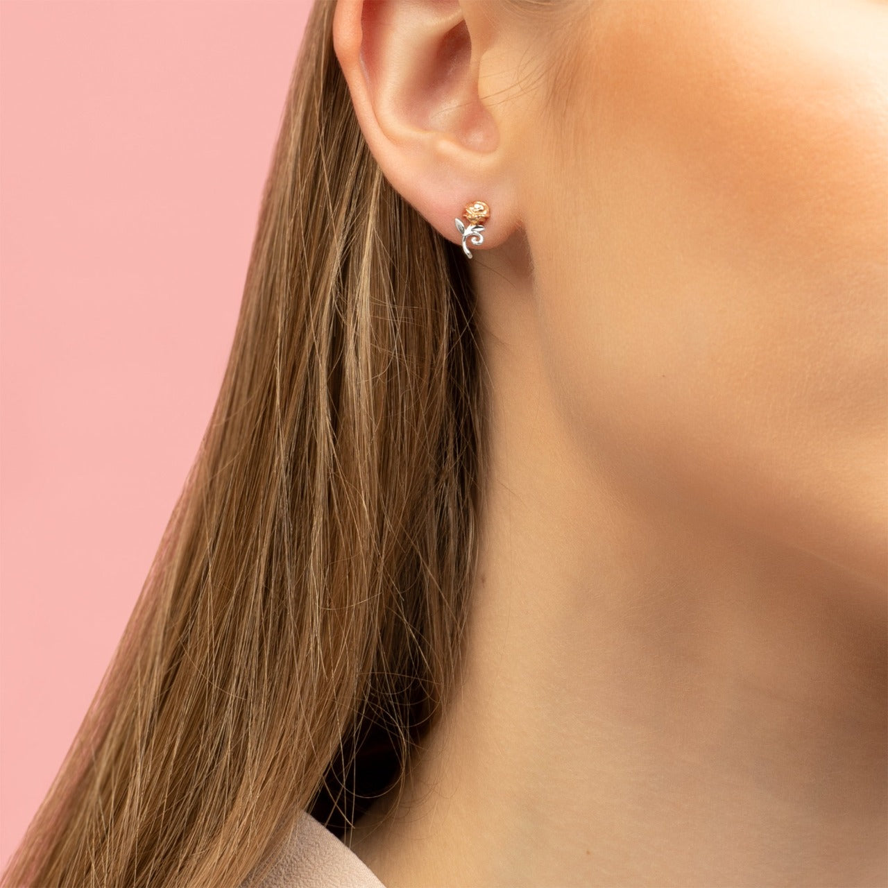 Disney Princess Silver and Rose Gold Earrings Disney Beauty and the Beast Princess Collection, these beautiful silver and rose gold Princess rose earrings adding a feminine touch to the Disney classic piece of Jewellery. Trendy and fashionable design, the Disney Princess collection, sterling silver and rose gold earrings add a chic, fun touch to any outfit.