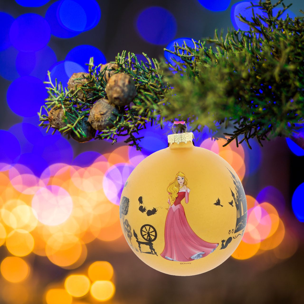 Disney Christmas Bauble Sleeping Beauty Once Upon a Dream Enchanting Disney Collection The princess Aurora dreams of her prince in this beautiful gold coloured glass bauble. This Sleeping Beauty treasured keepsake would make a lovely unique gift for a friend, or a self-purchase to brighten up the home. Presented in a branded window box.