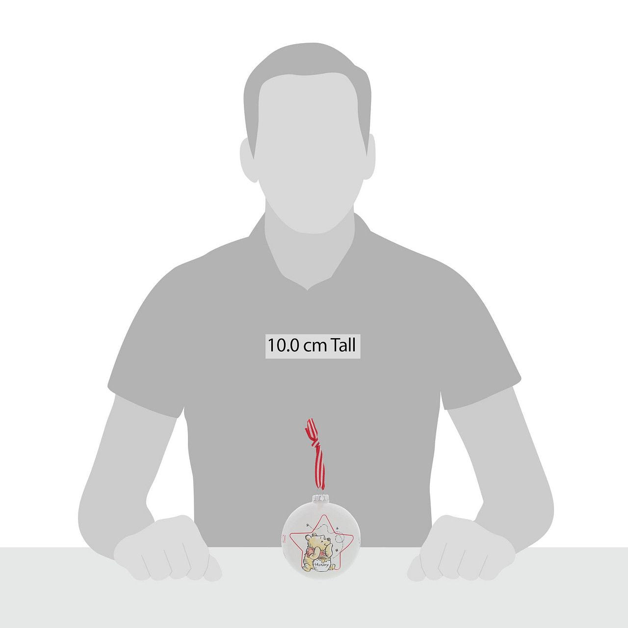 Christmas Bauble Disney Winnie The Pooh Winnie the Pooh dreams about honey all day and this cute design shows that it is no exception at Christmas time. Sometimes the smallest things take up the most room in your heart and this glass bauble is the perfect example.