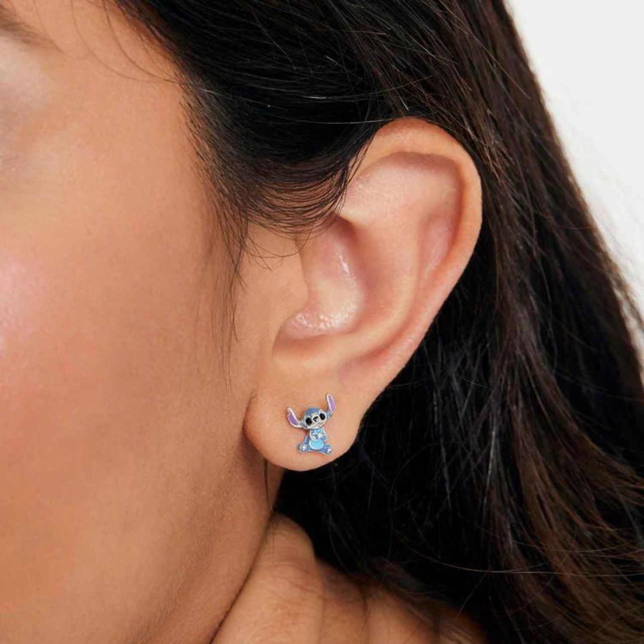 Disney Lilo and Stitch Sterling Silver 3D Blue Enamel Earrings These adorably crafted Disney Stitch earrings are crafted from sterling silver with a blue enamel finish, lending a touch of whimsy to any ensemble.
