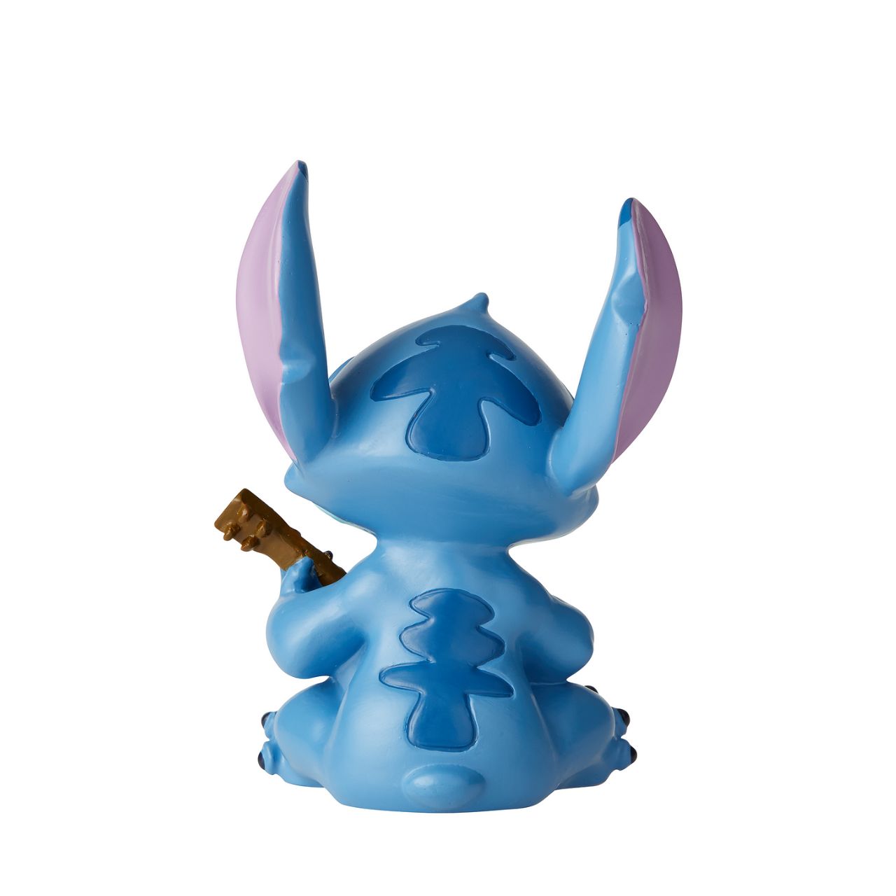 Stitch Guitar Figurine Disney Showcase Here to play you your favourite tune, Lilo's best friend Stitch will turn any frown upside down. With perked ears and a sweet smile, this little guy will help your mind drift away to Hawaiian paradise.