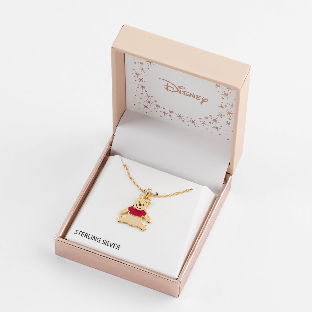 Disney Winnie The Pooh Sterling Silver Necklace with Pendant These exquisitely designed Winne the Pooh silver necklace, form a silhouette of Winnie's famous pose adding a feminine touch to the classic piece of jewellery Trendy and fashionable design, the Disney Winnie The Pooh pendant adds a chic, fun touch to any outfit.