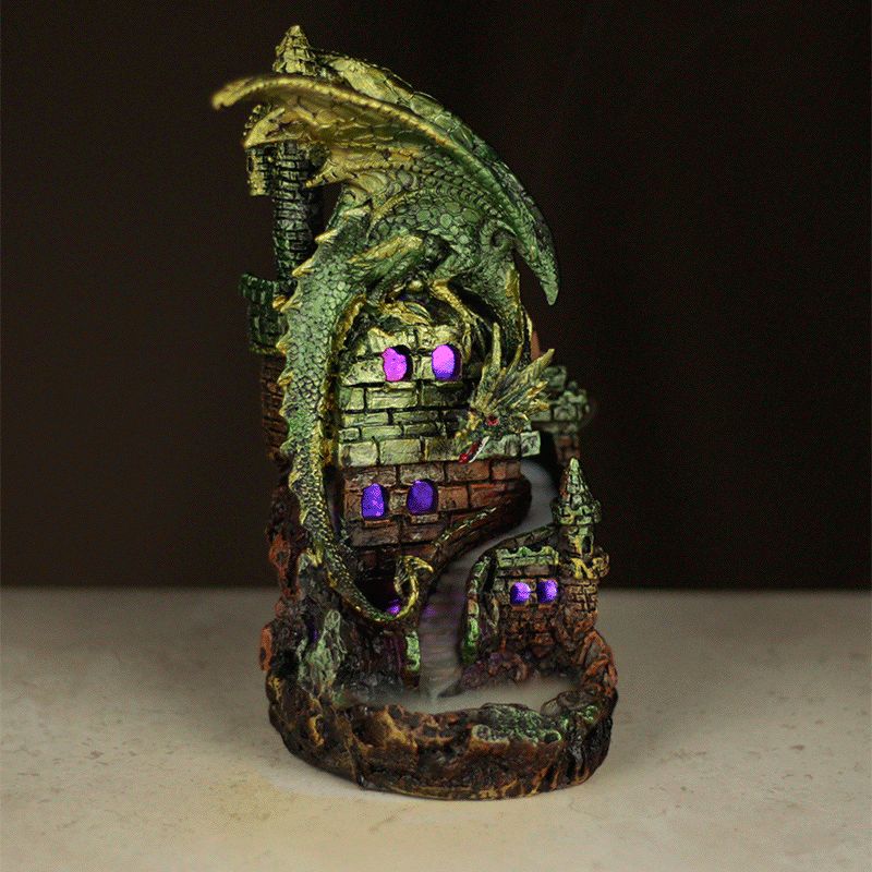 Dragon Castle LED Backflow Incense Burner Backflow incense flows down through a backflow burner and creates a mist around the product. This item must be placed on a heatproof surface.