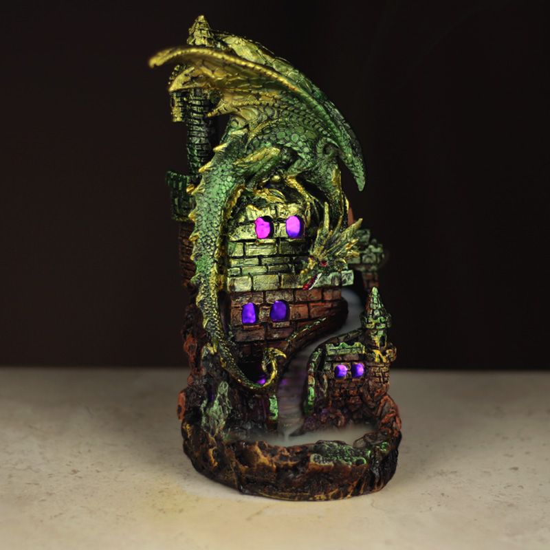 Dragon Castle LED Backflow Incense Burner Backflow incense flows down through a backflow burner and creates a mist around the product. This item must be placed on a heatproof surface.