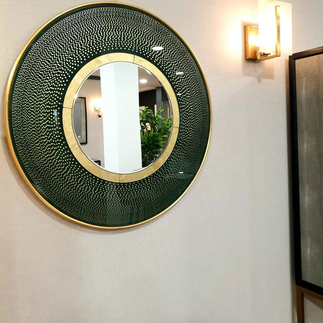 Elva Round Mirror by Mindy Brownes  Mindy Brownes Interiors Elva Round Mirror  - A true statement piece. - An art deco-inspired mirror. - Finished in forest green with vibrant gold trim and polka dot detailing. - Perfect for adding a pop of colour to your home. - Ideal for above your console, hall table, or sideboard.