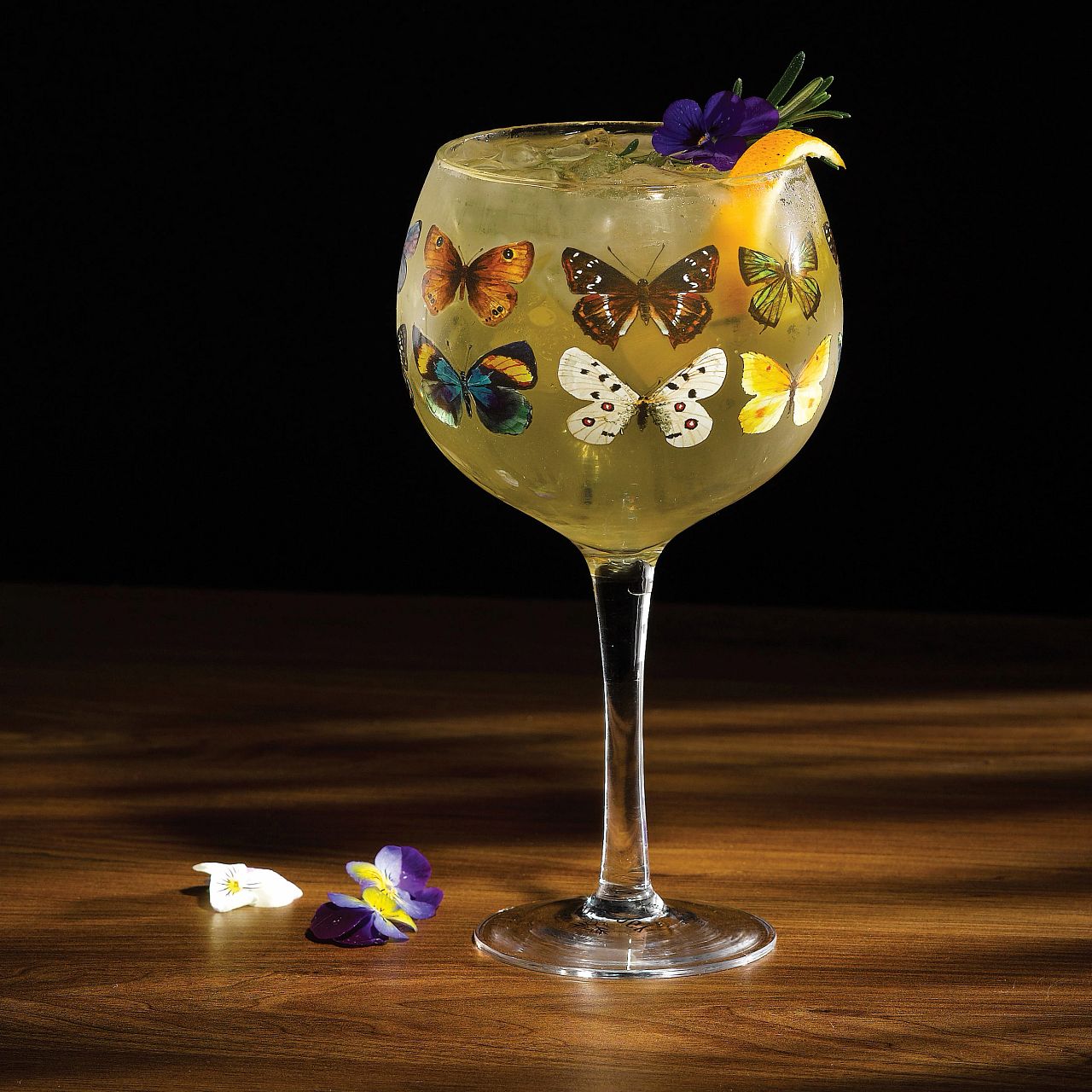 Ginology Butterflies Copa Gin Glass A gin glass fit for any social butterfly. Cheers to the beauty of nature, bright and beautiful, these butterflies will flutter right into your heart with each sip.Ginology Butterflies Copa Gin Glass A gin glass fit for any social butterfly. Cheers to the beauty of nature, bright and beautiful, these butterflies will flutter right into your heart with each sip.