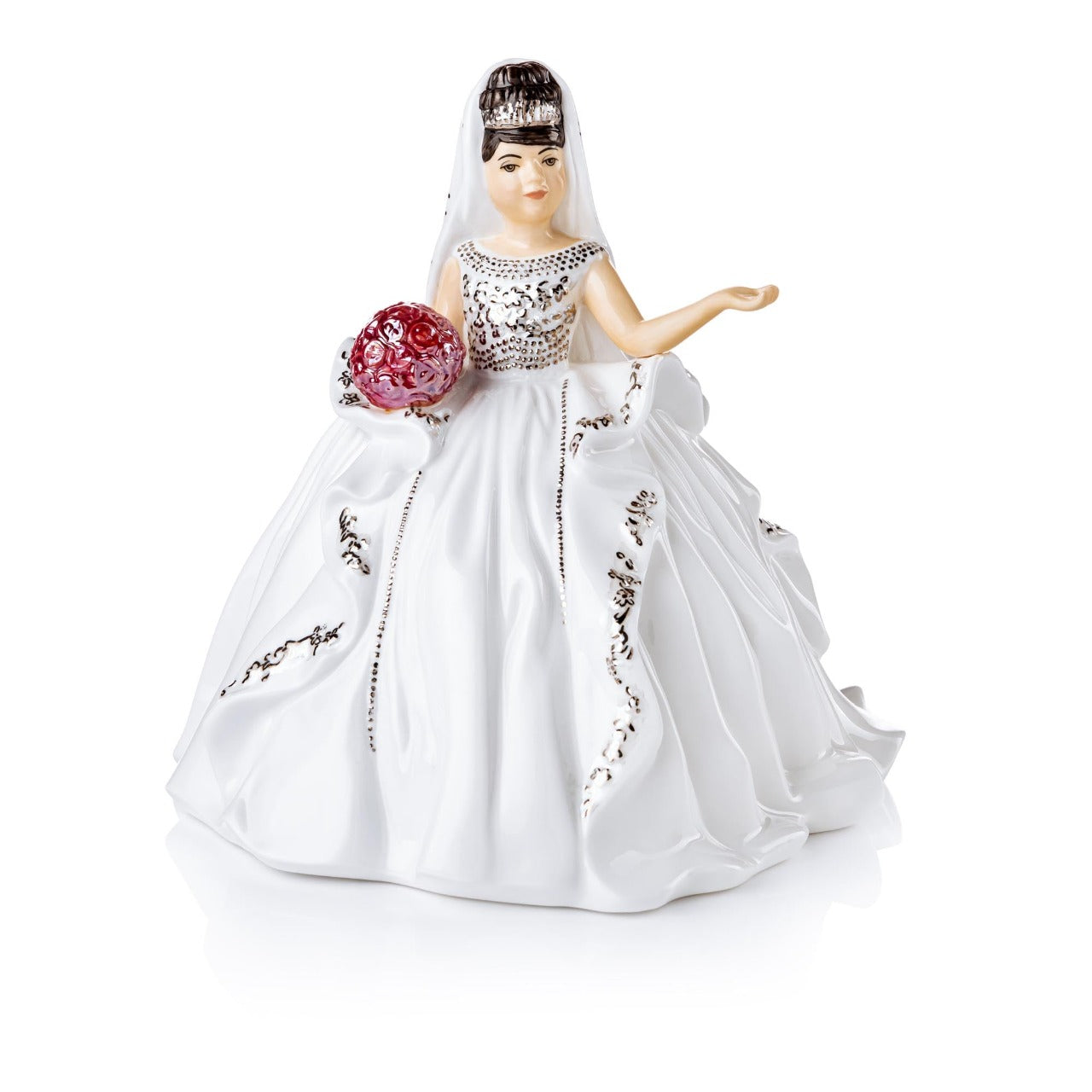 English Ladies Mini Gypsy Affection Brunette Gypsy Affection is the latest edition to the range and comes in both blonde and brunette and also in mini-figures. This gorgeous figurine stands out from the crowd with stunning gold details throughout the dress and on her beautiful crown.