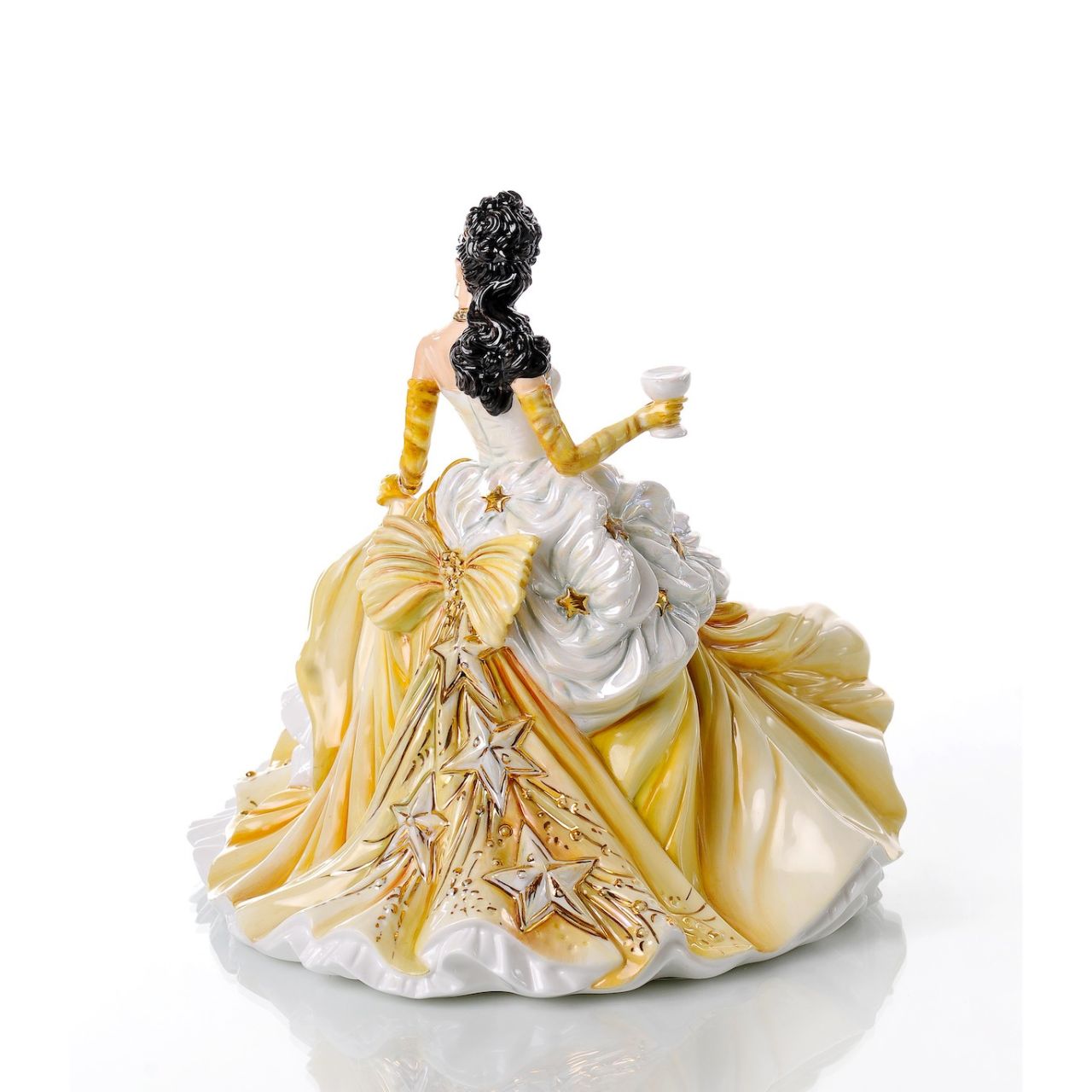 English Ladies Congratulations Gold  Our Congratulations Gold figurine is one of our best sellers from the English Ladies Congratulations Collection. This is an amazing fine bone china figurine, designed by renowned modeller Valerie Annand and Master Painter Dan Smith, for our Congratulations figurines range.