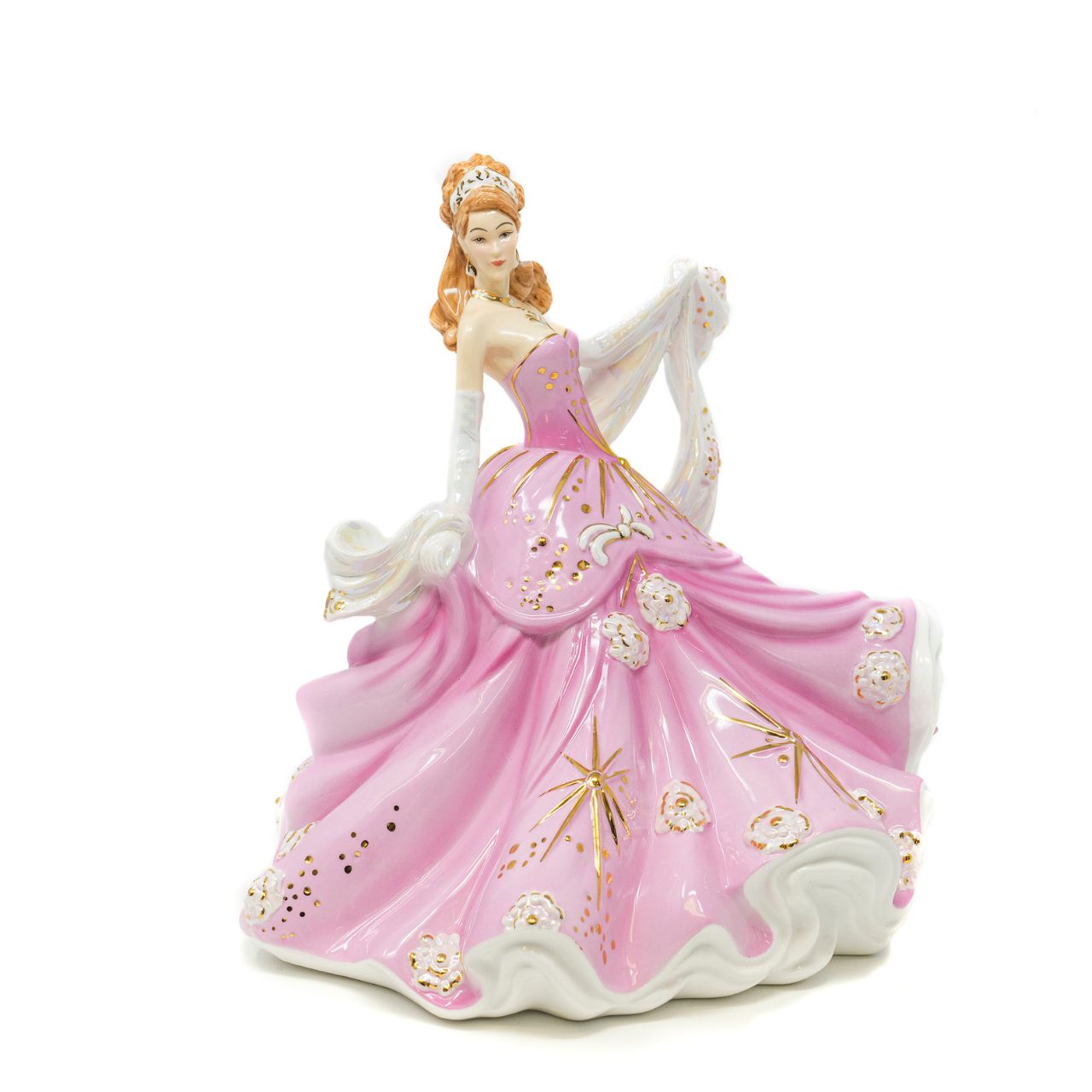 English Ladies Sweet Radiance  From our English Ladies Co Radiance Collection, the Sweet Radiance figurine. This figurine has been modelled by Valerie Annand and hand-painted and decorated by our Master Painter Dan Smith. The Sweet Radiance figurine comes in a light floral pink colourway and has been detailed with Mother of Pearl lustre and real gold highlights.