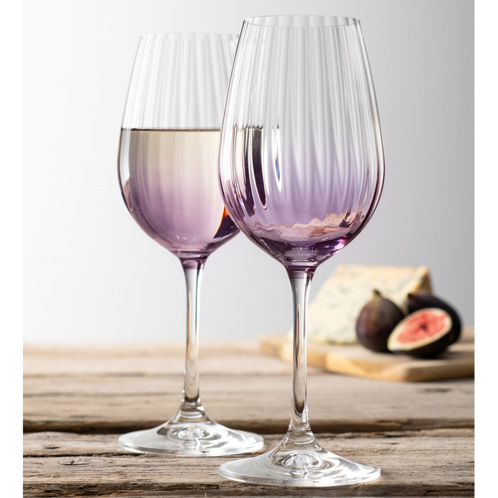Galway Crystal Erne Wine Pair Amethyst These beautifully crafted Galway Crystal wine glasses with an amethyst coloured base are essential glasses for your home and are designed for fine wine lovers. The elegant shape of the glass along with the Erne pattern displays light lines along the body adding a stylish and modern finish.
